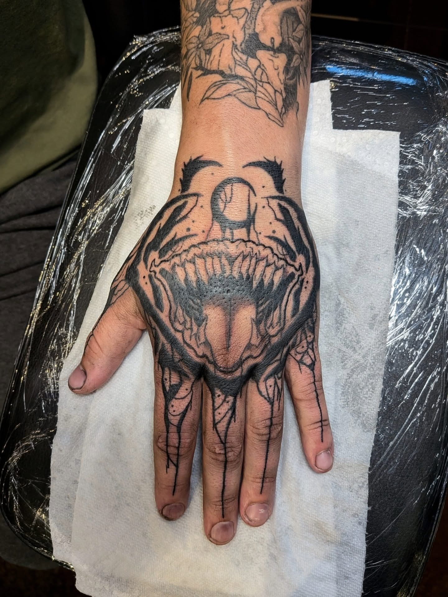 Demon face dark realism tattoo on the hand by Damon 🥀