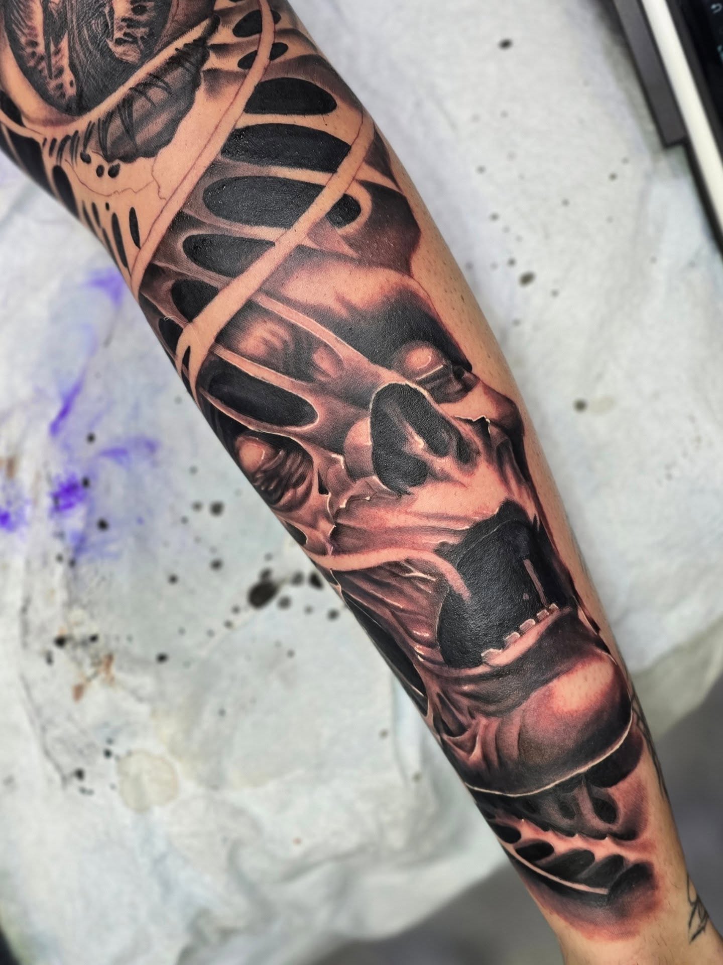 Mechanical skeleton realism tattoo on the forearm by Myth & Mercy Tattoo Co.