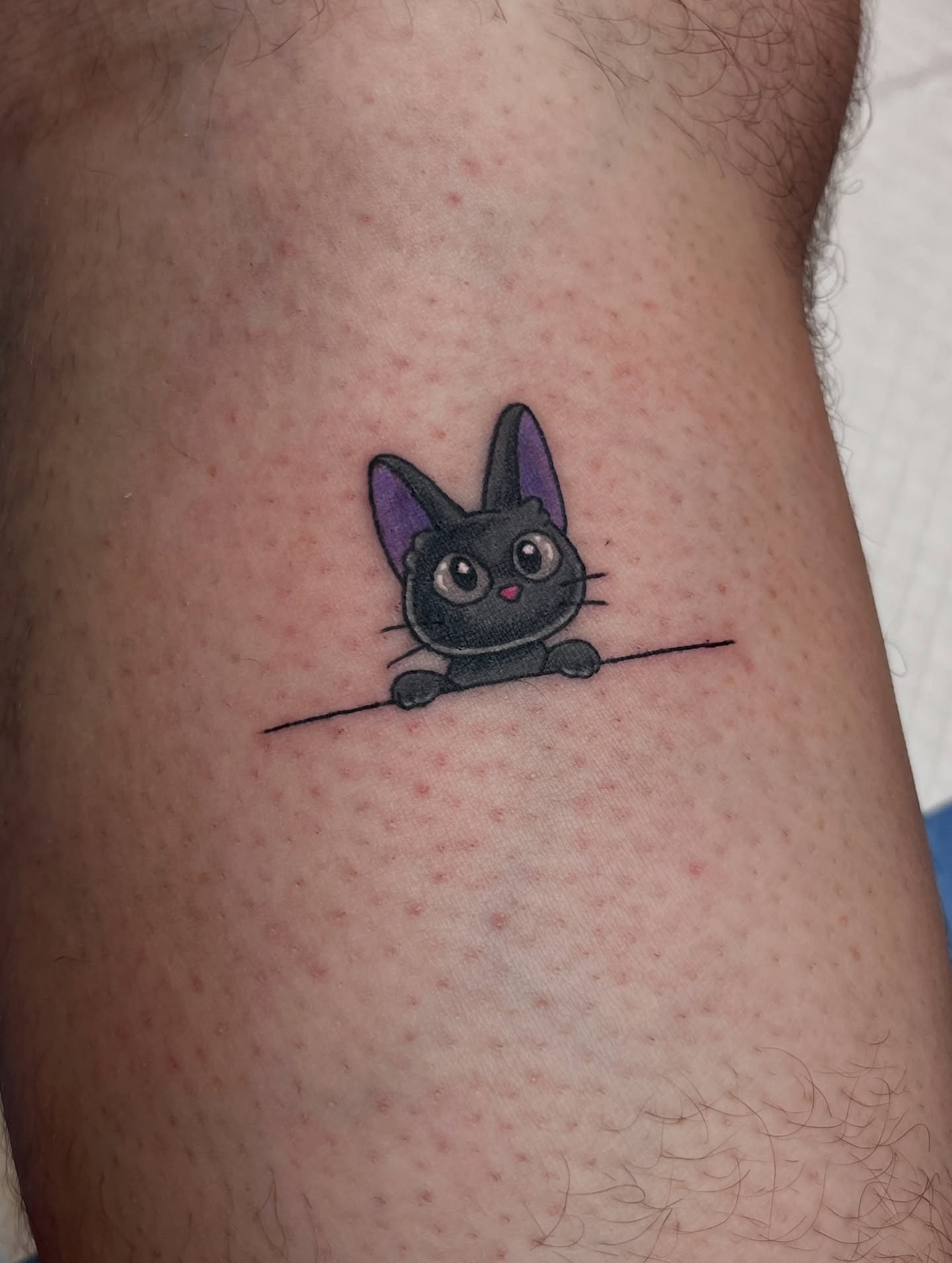 Cat dotwork tattoo on the forearm by Cheyanne Peck