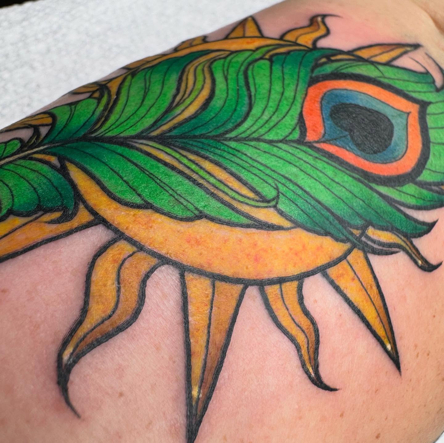 Peacock American traditional tattoo on the shoulder by 𝕷𝖊𝖝𝖎 𝕽𝖚𝖓𝖞𝖔𝖓