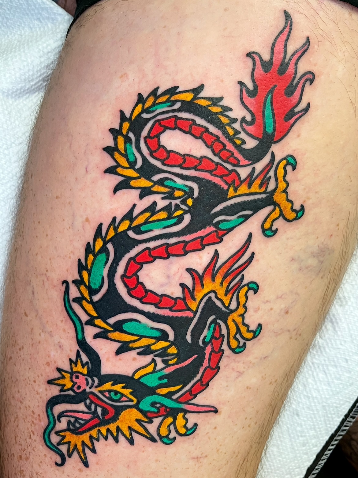 Dragon American traditional tattoo on the thigh by π΅ππππ π¬ππππ