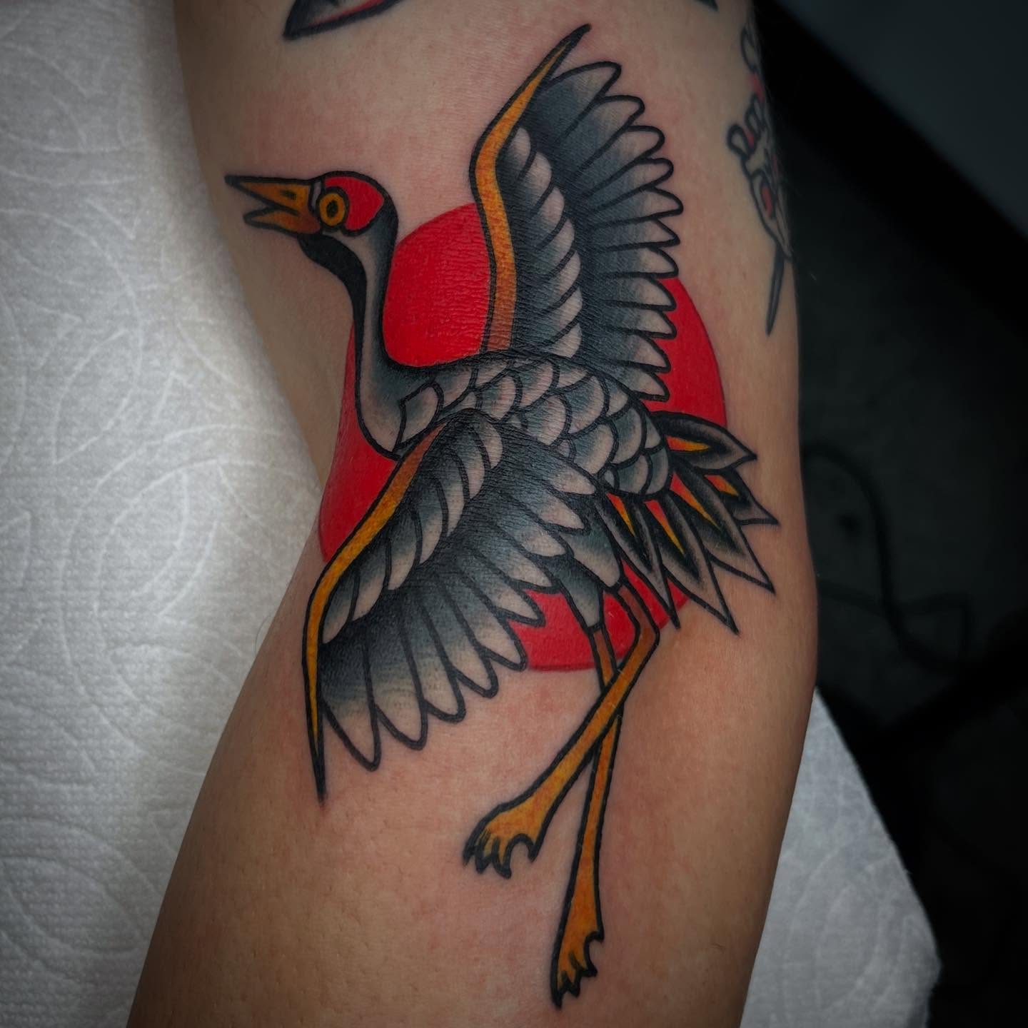 Bird American traditional tattoo on the forearm by andrewtattoos