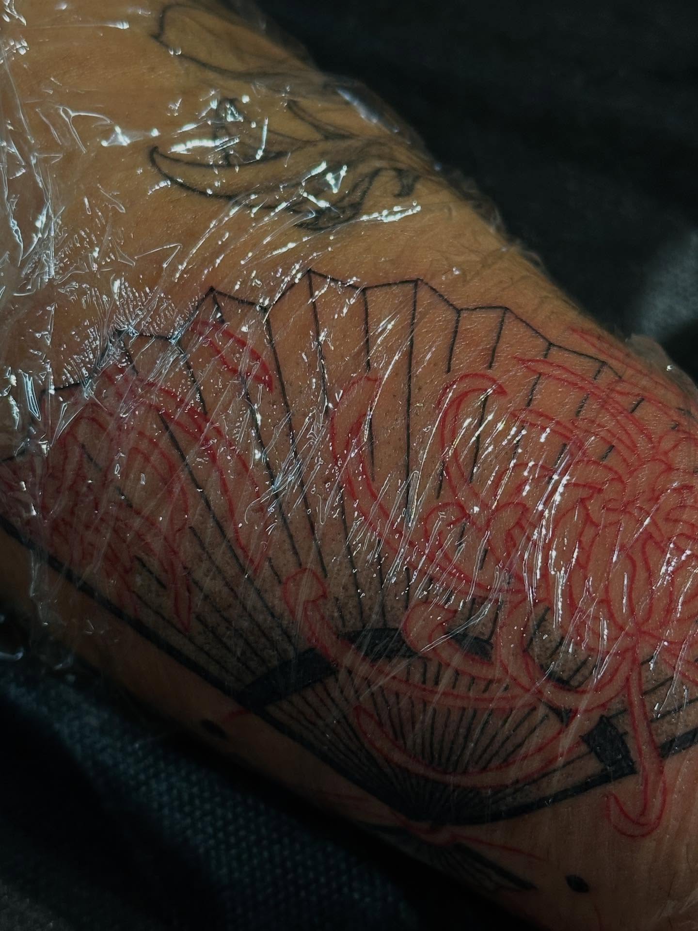 Fan and dragon japanese irezumi tattoo on the forearm by christian martinez