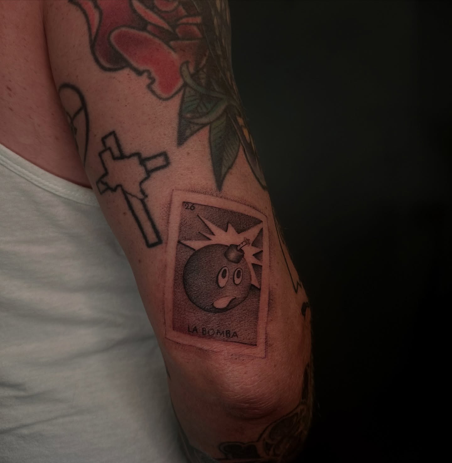 Bomb dotwork tattoo on the forearm by Joe Cruz