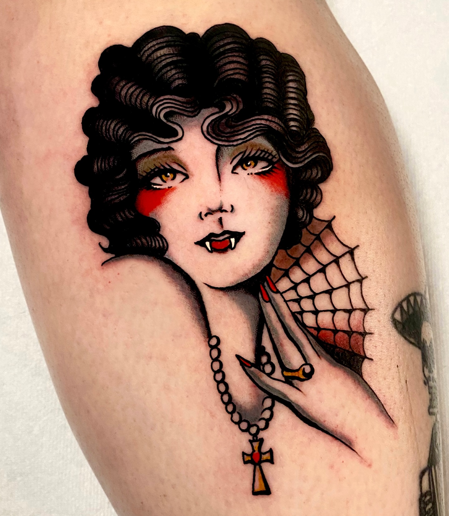Vampire woman American traditional tattoo on the thigh by Haley Tucker, Sebastopol, California