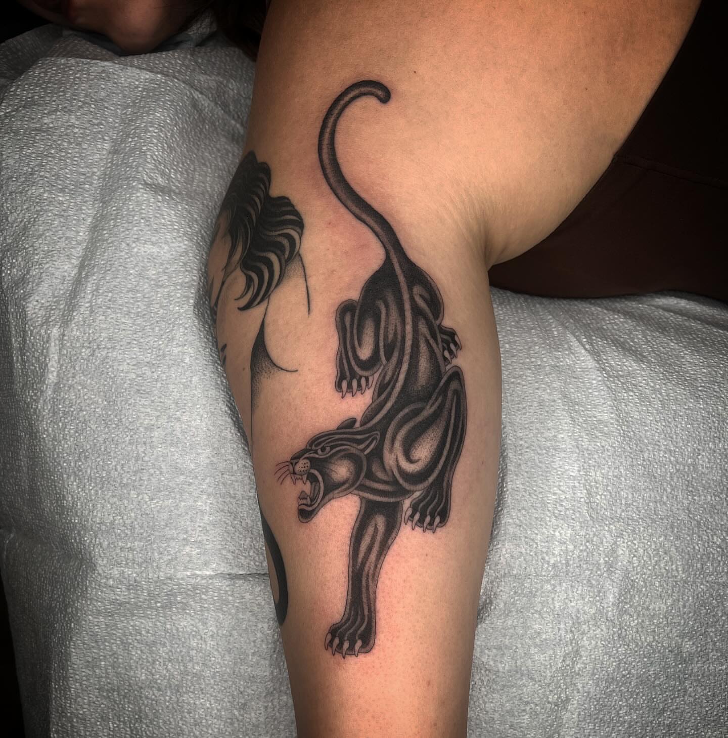 Panther black and grey tattoo on the forearm by linahsiaotattoo