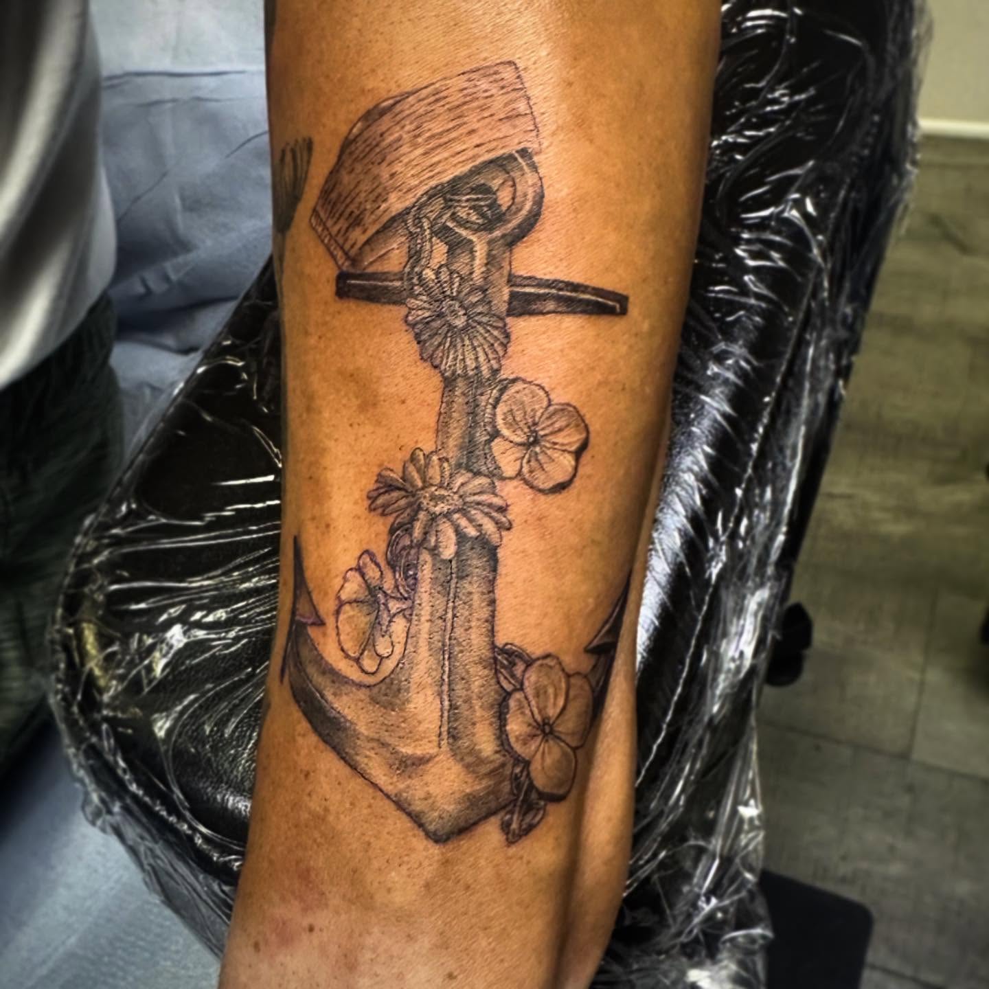 Anchor with flowers black and grey tattoo on the forearm by 🌜🔮✨Anya Casey✨🔮🌛