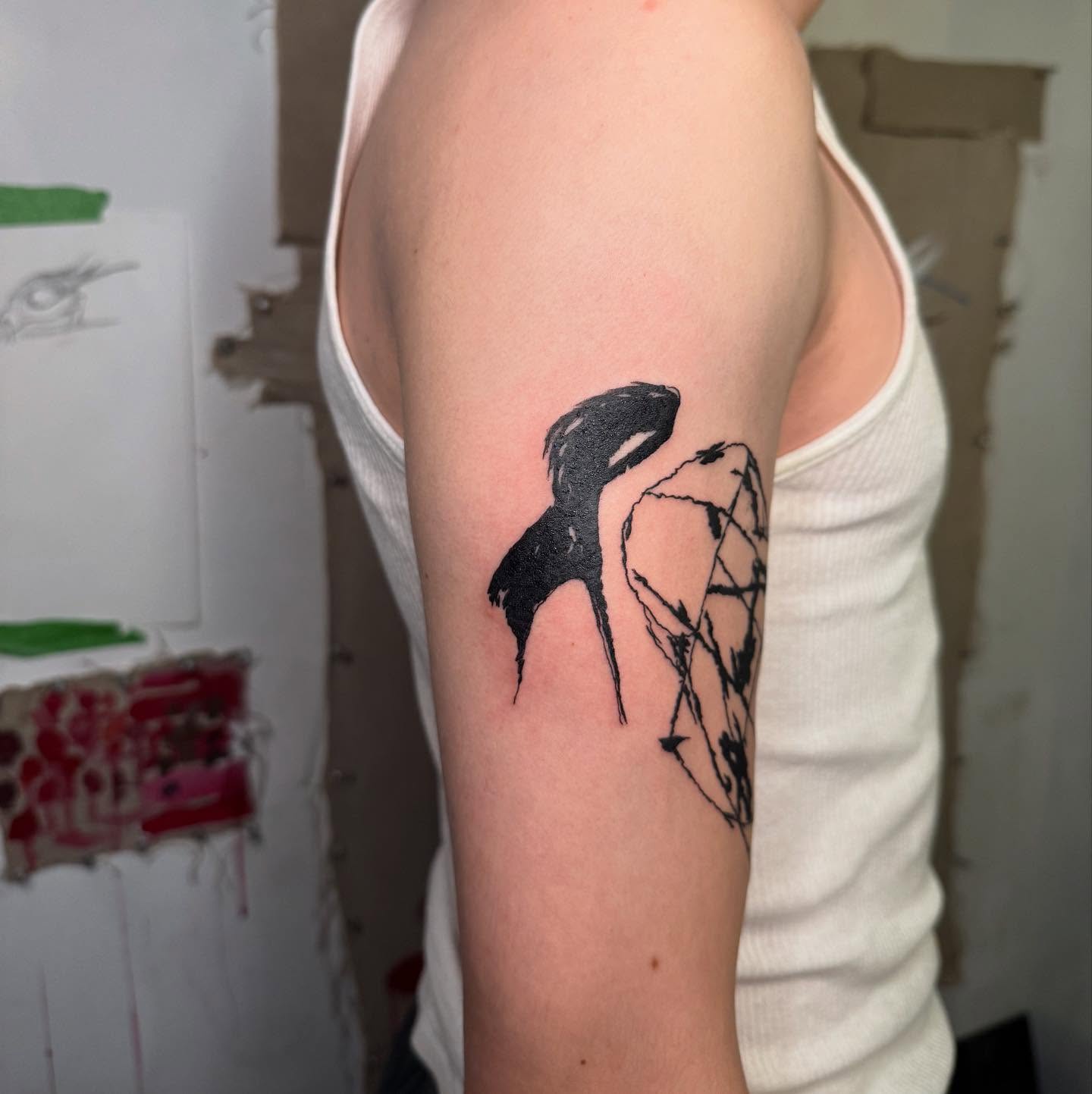 Swallow and wire black and grey tattoo on the forearm by @godsfirmgrip