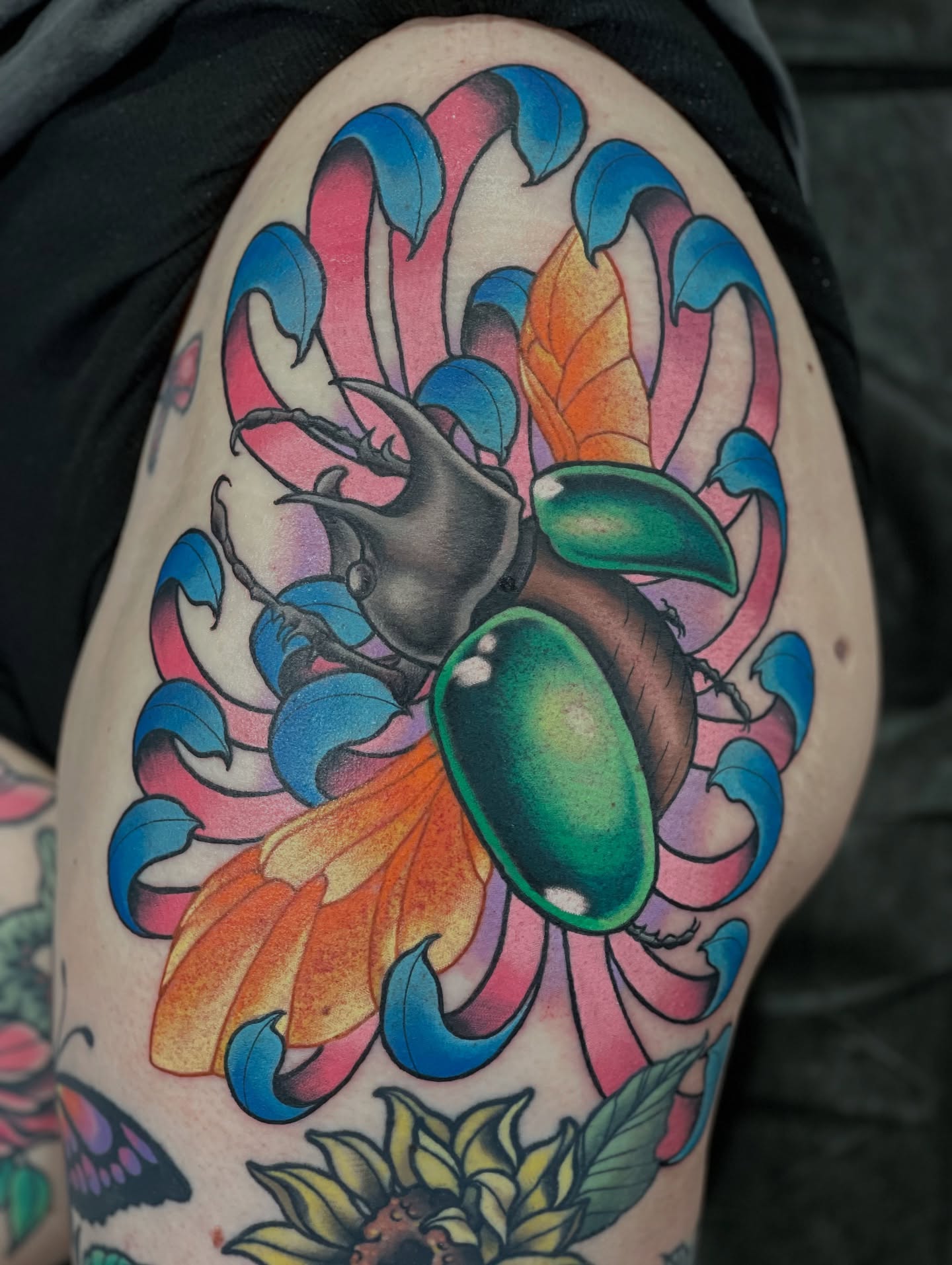 Rhinoceros beetle American traditional tattoo on the thigh by James Mullin
