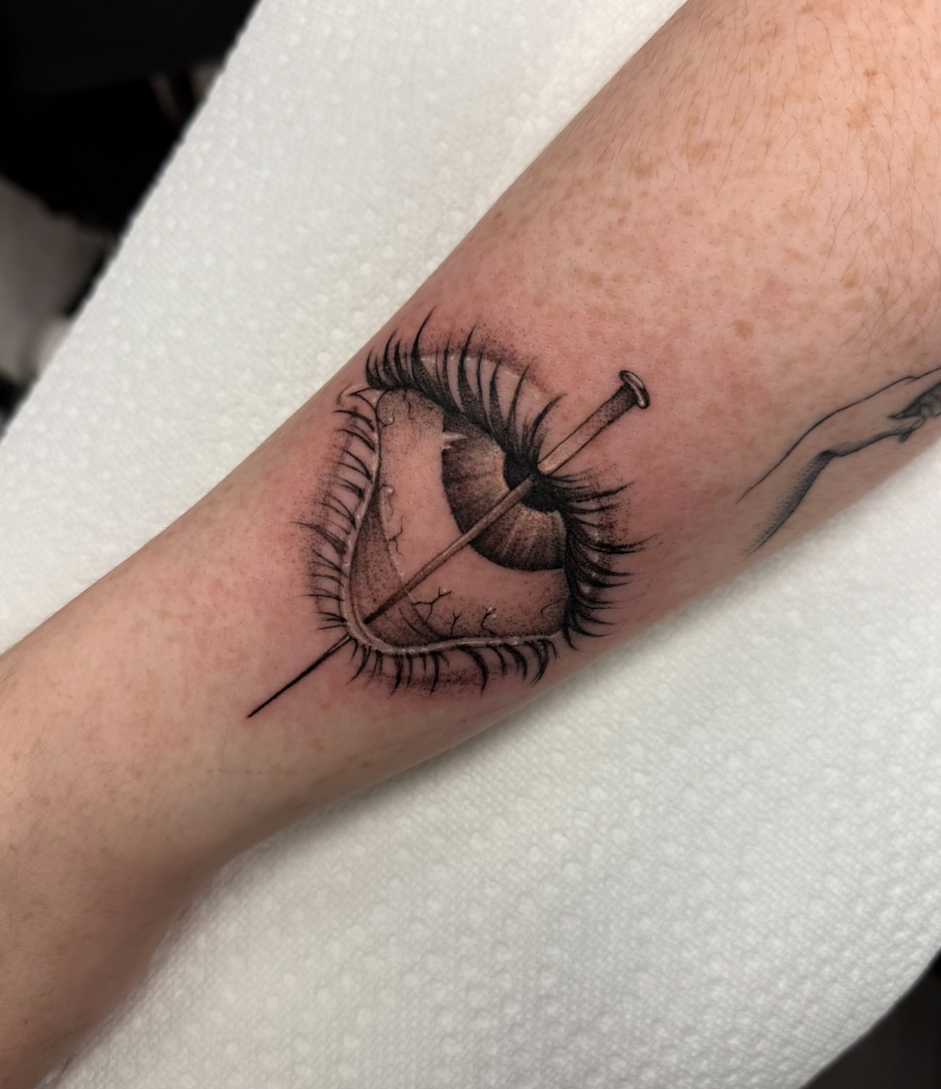 Eye with arrow realism tattoo on the forearm by dinah