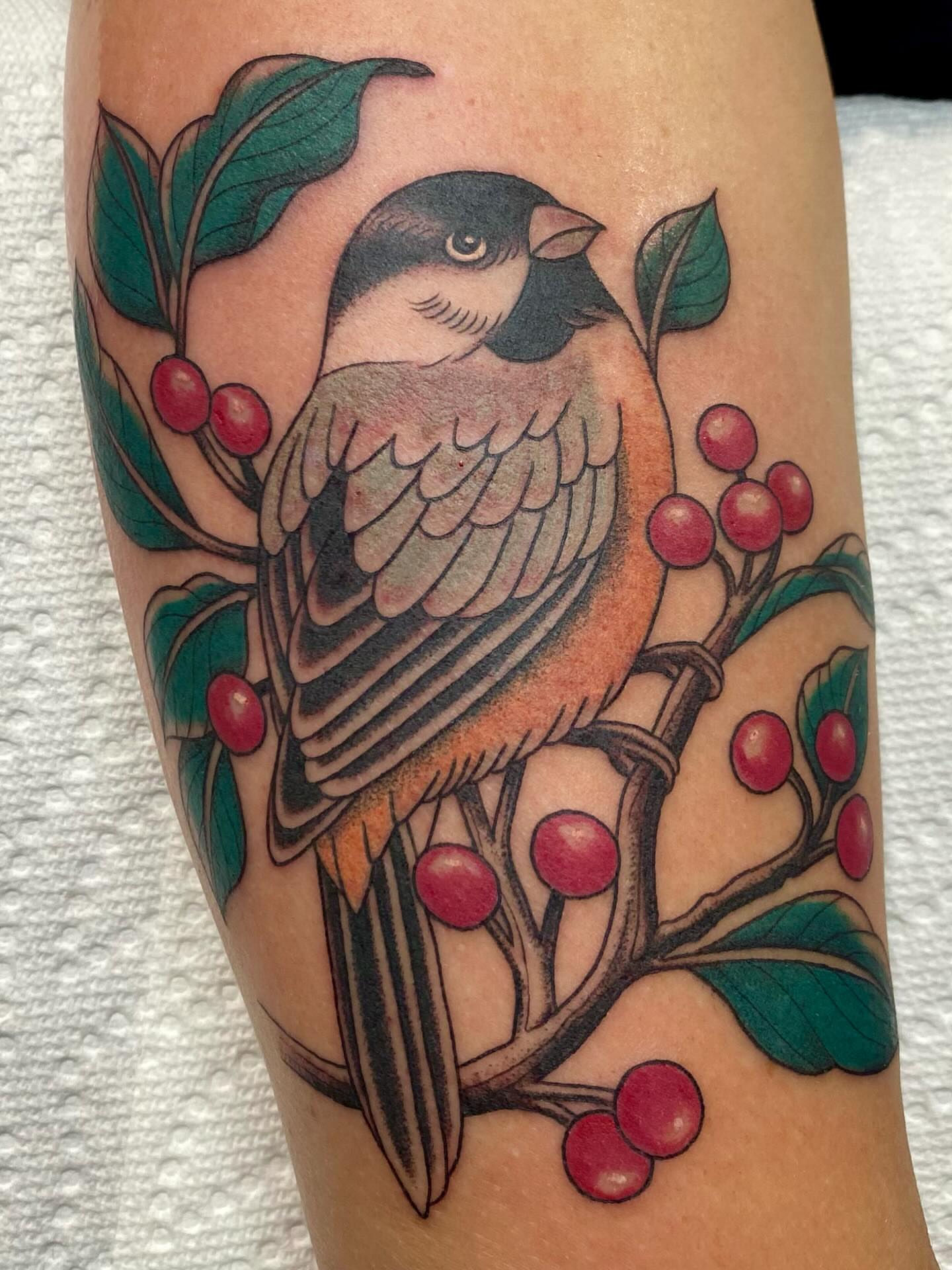 Bird and berries American traditional tattoo on the forearm by Kiera ❤️‍🔥