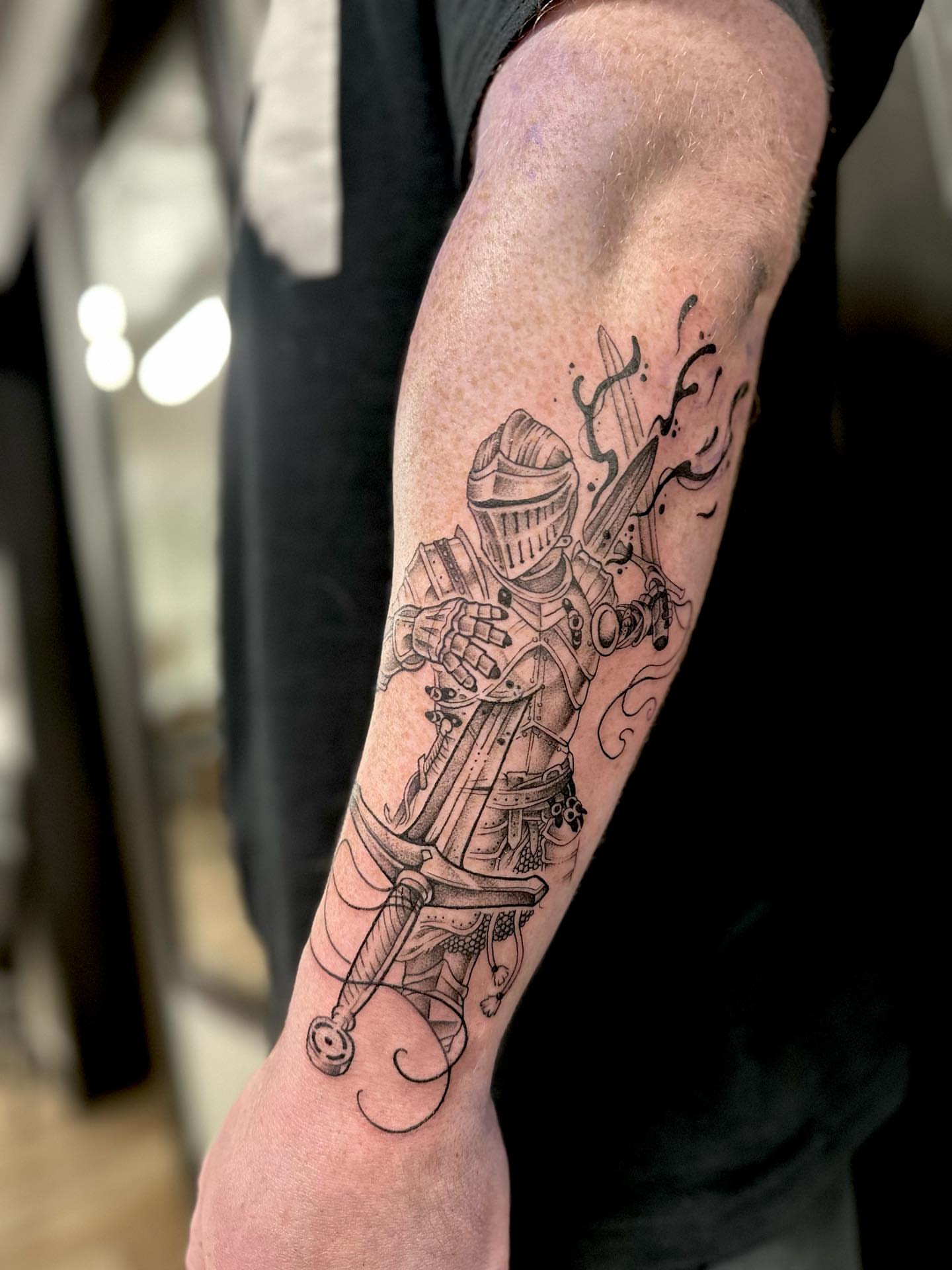 Knight with sword realism tattoo on the forearm by Ciera High l Tattoo Artist