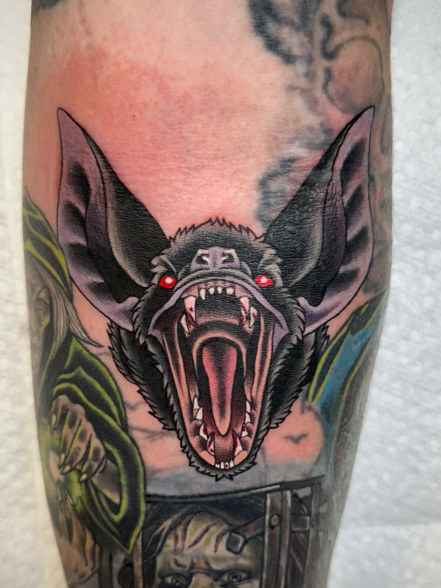 Bat American traditional tattoo on the forearm by Savannah Compton