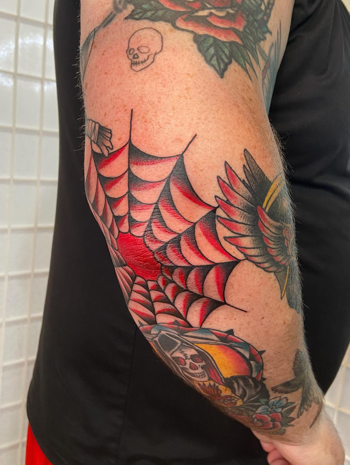 Snake and wings American traditional tattoo on the forearm by Tattoos by Dale Hupke, Lebanon, Ohio