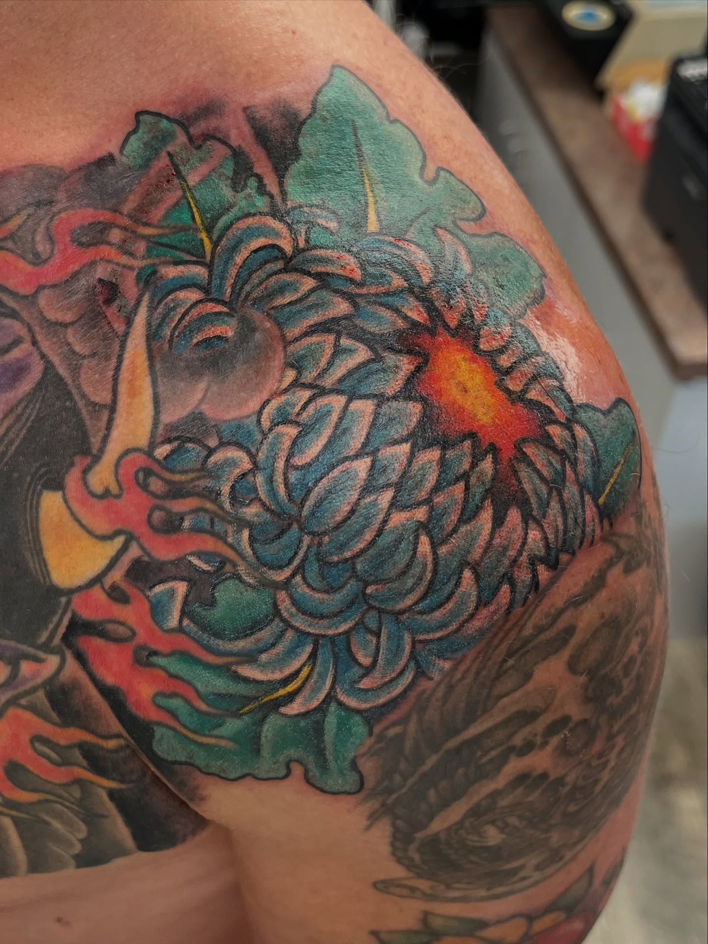 Chrysanthemum japanese irezumi tattoo on the shoulder by Steve Tiberi