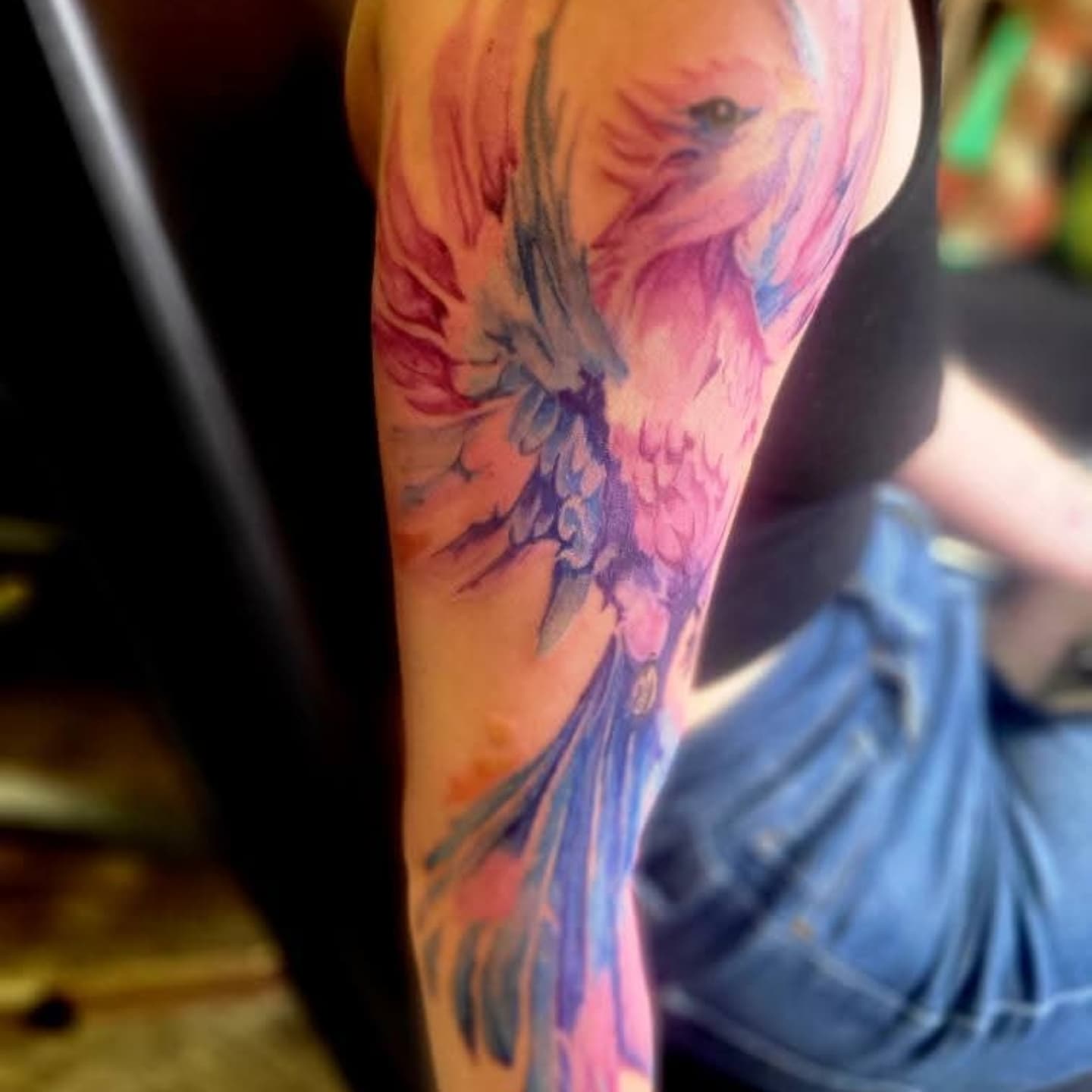Watercolor phoenix watercolor tattoo on the forearm by Naez Ink AKA Renae Madison, Macomb, Illinois