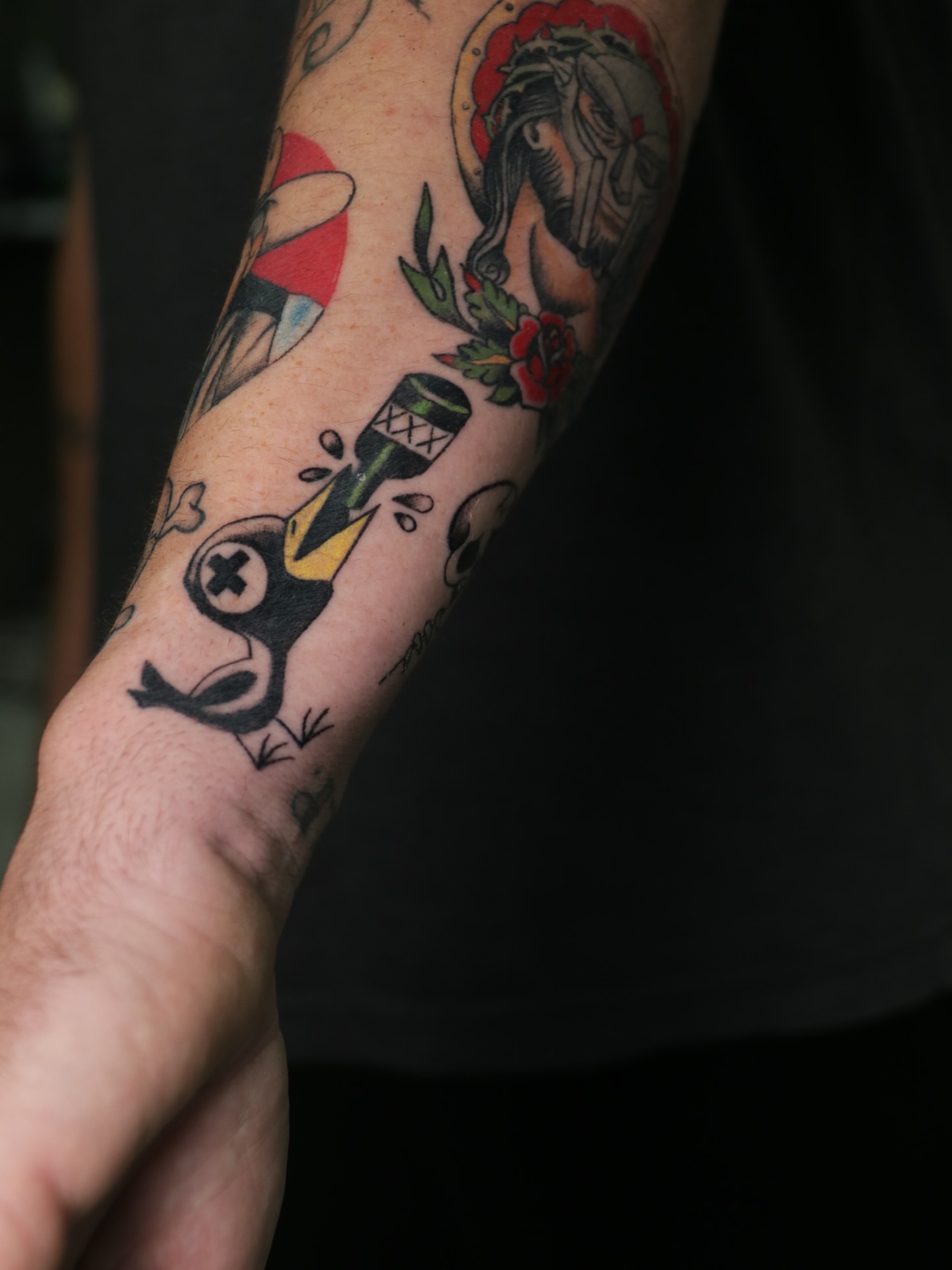 Microphone and skull American traditional tattoo on the forearm by Melissa C, Phoenix, Arizona