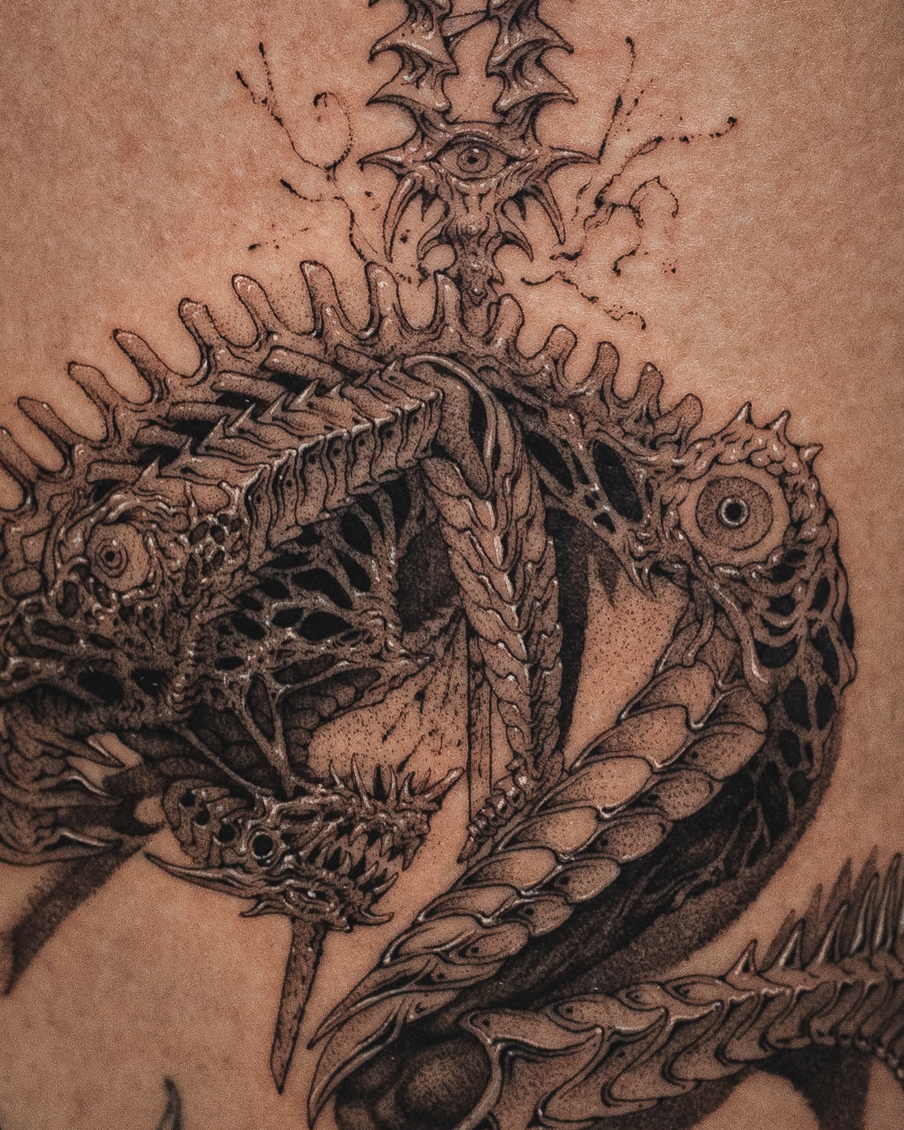 Tattoo by @nowthisyujhi — black_and_grey, geometric