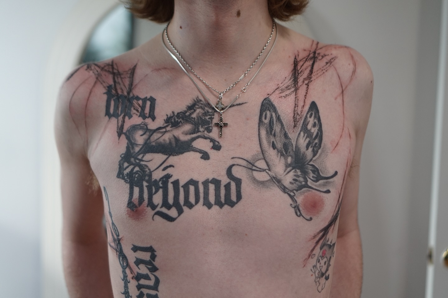 Butterfly and unicorn realism tattoo on the chest by Young one 영원