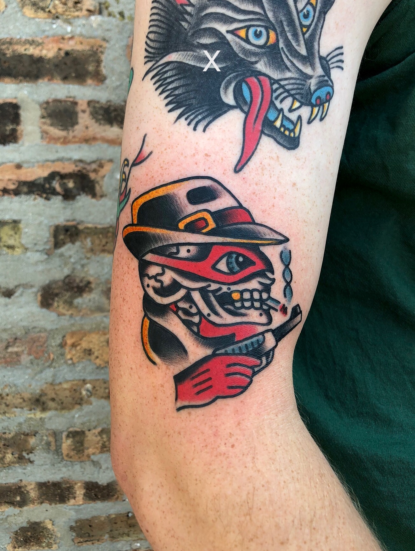 Masked skeleton American traditional tattoo on the forearm by Nick Sharratt, Chicago, Illinois