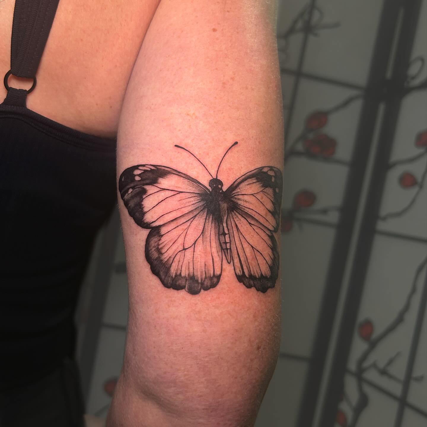 Butterfly realism tattoo on the forearm by Chloe