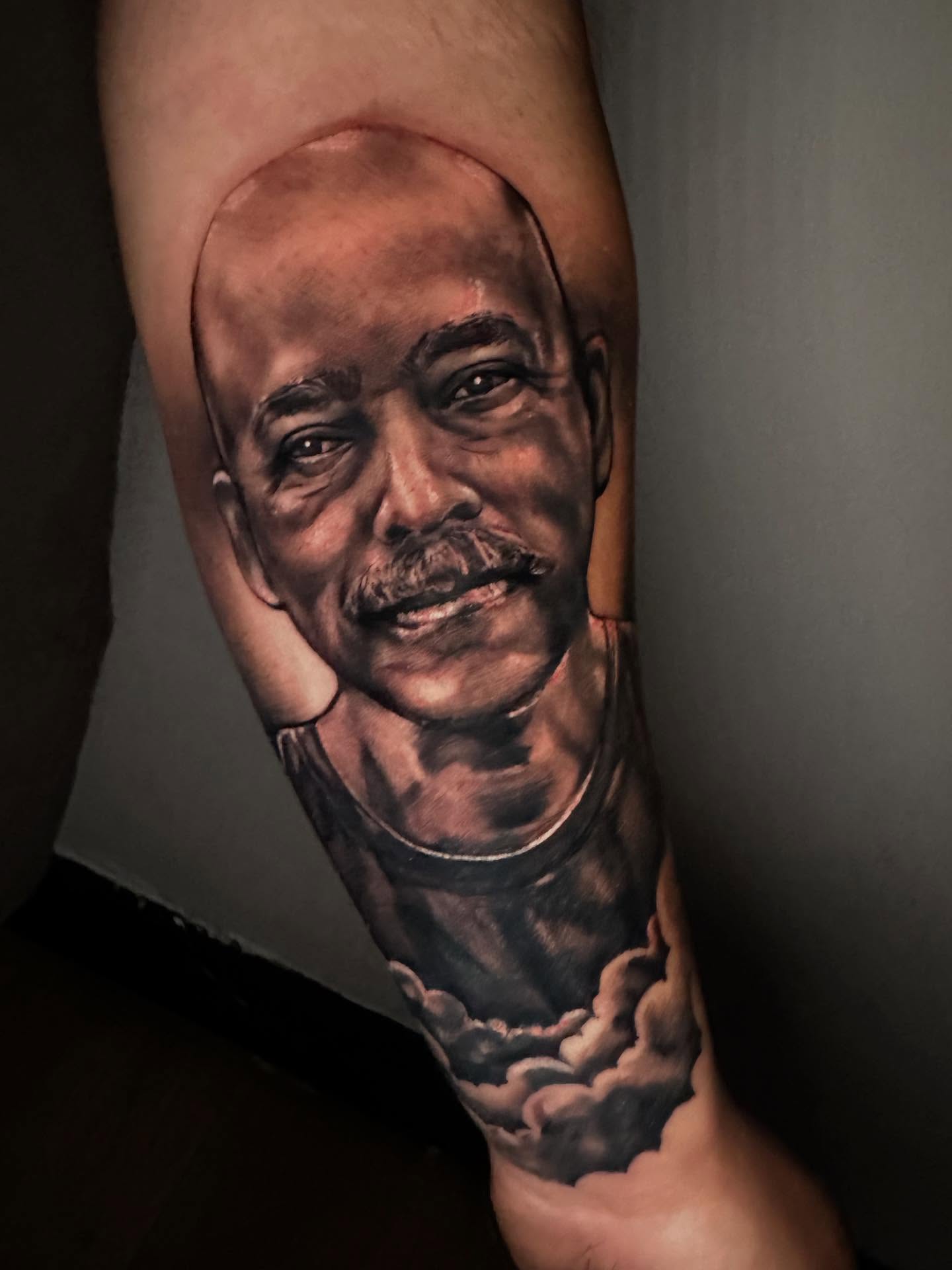 Portrait realism tattoo on the forearm by Pablo Venegas