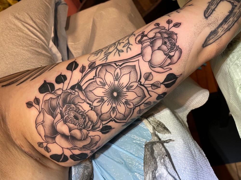 Floral bouquet dotwork tattoo on the forearm by Lake Stephens, Richmond, Virginia