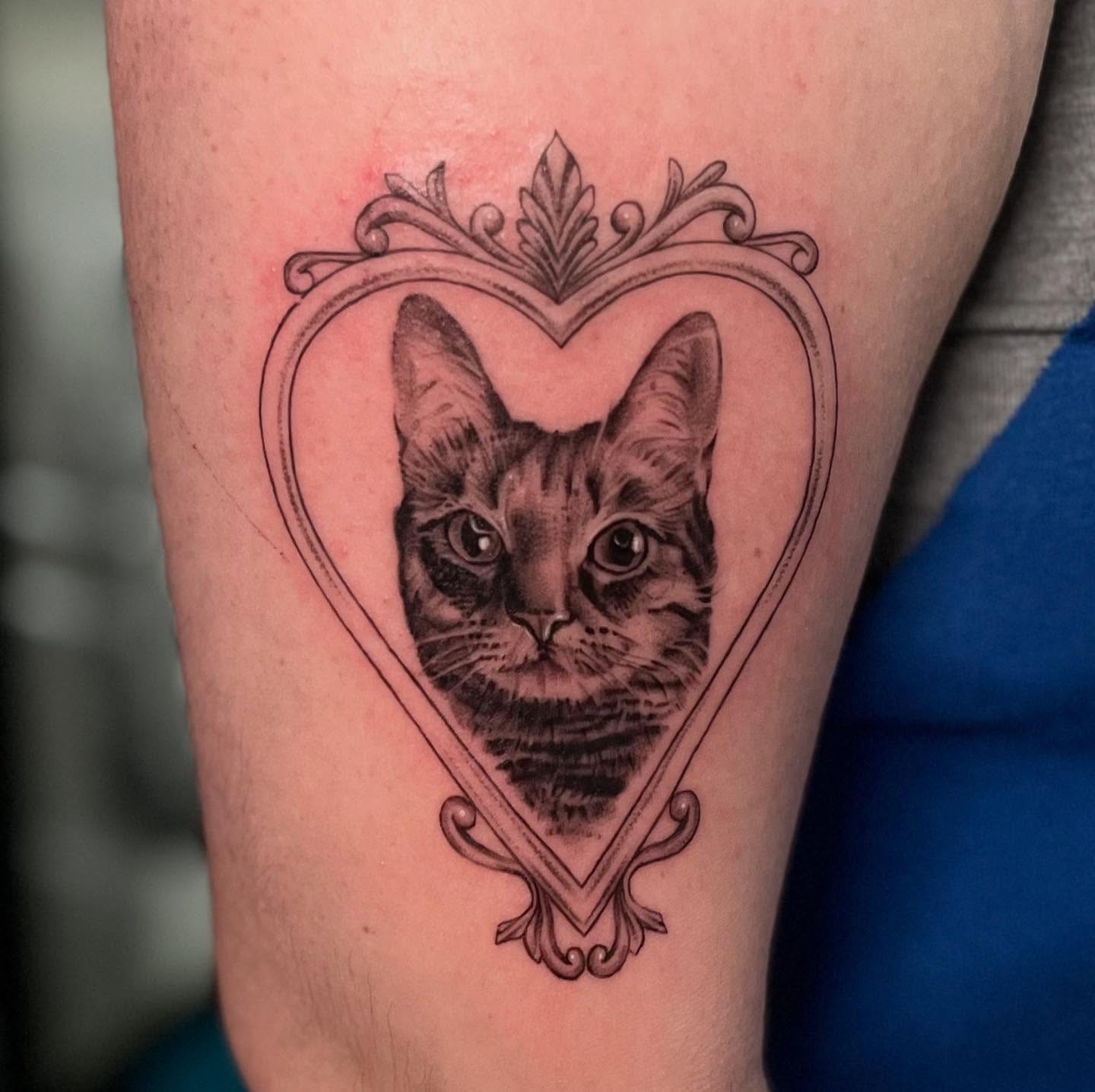 Cat realism tattoo on the forearm by Lee Ranco