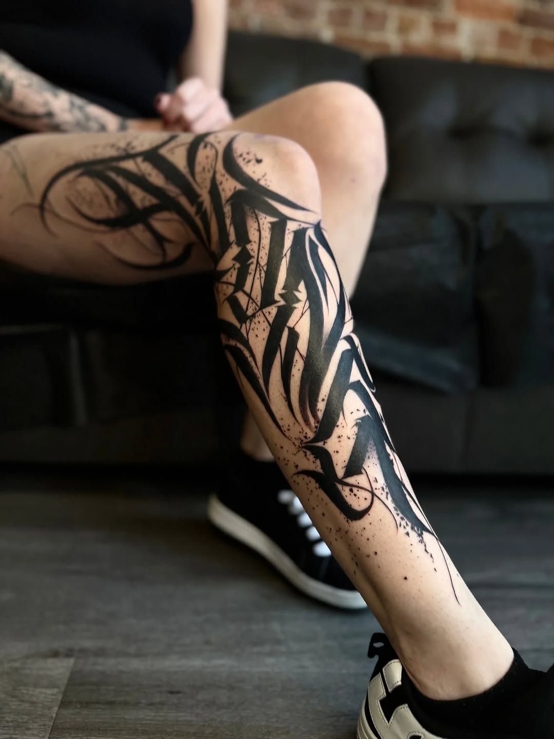 Tattoo by @wiseroner — lettering_script, blackwork