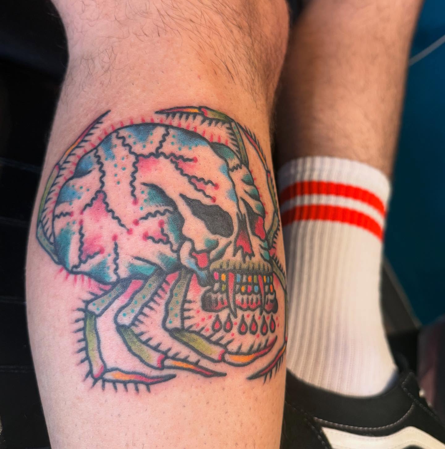Skull American traditional tattoo on the forearm by Joe Truck