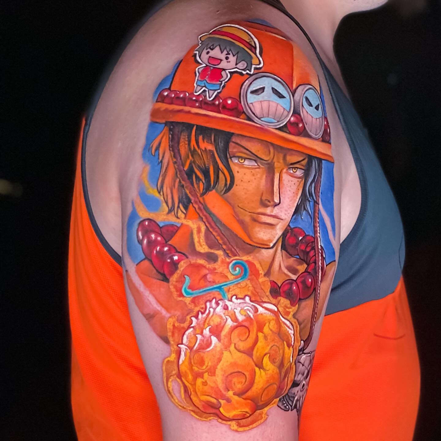 Monkey D. Luffy anime tattoo on the upper arm by Picasso Dular, Lake Forest, California