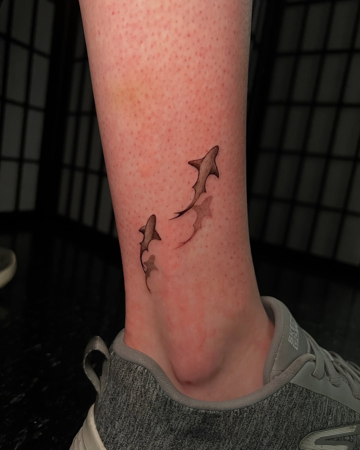 Sharks realism tattoo on the forearm by Baung Ben