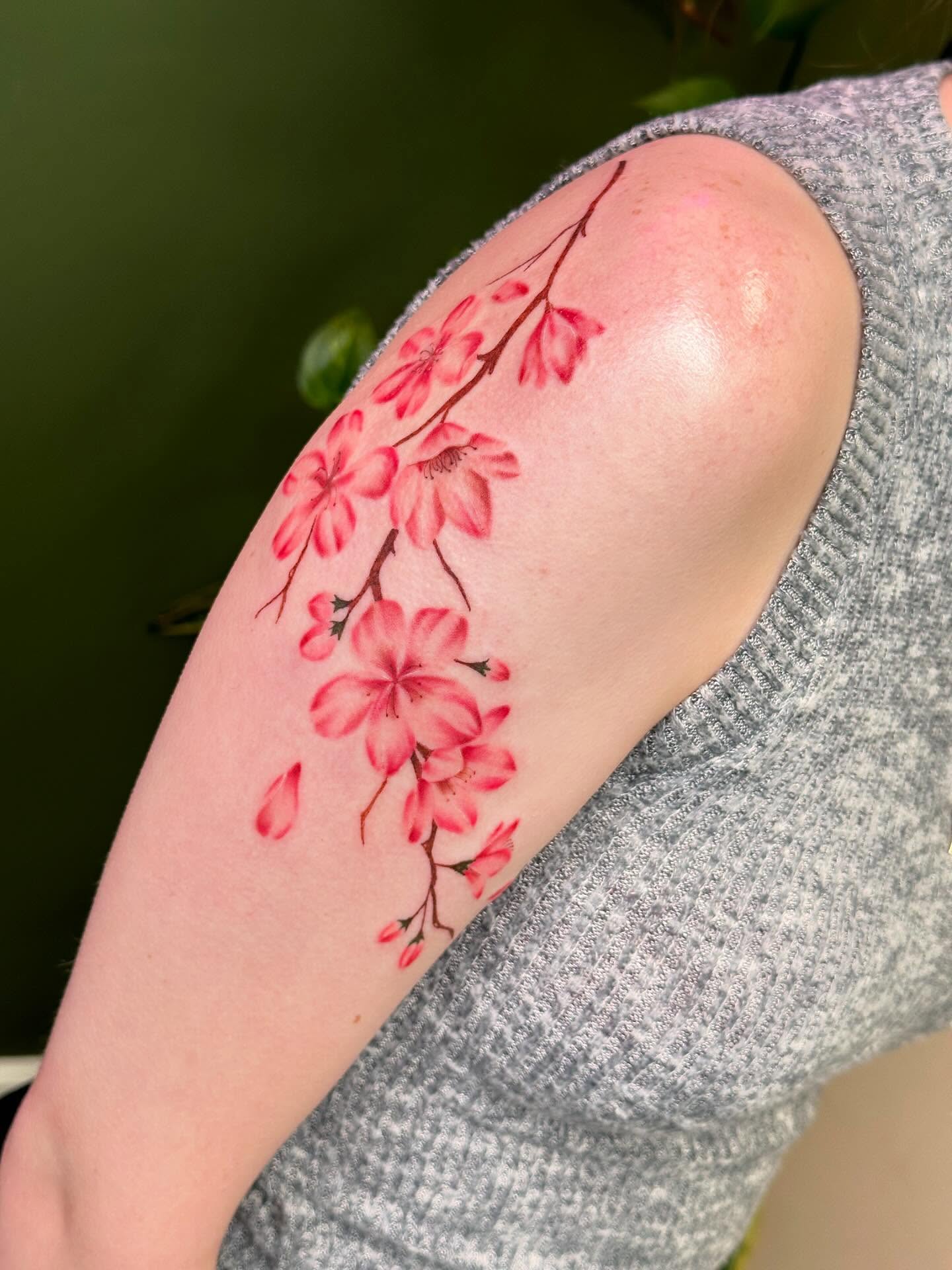 Cherry blossoms dotwork tattoo on the forearm by Diana Kunz