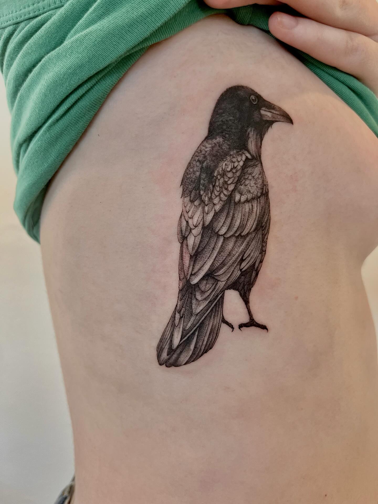Crow black and grey tattoo on the thigh by Kite.Tattoo_Amber