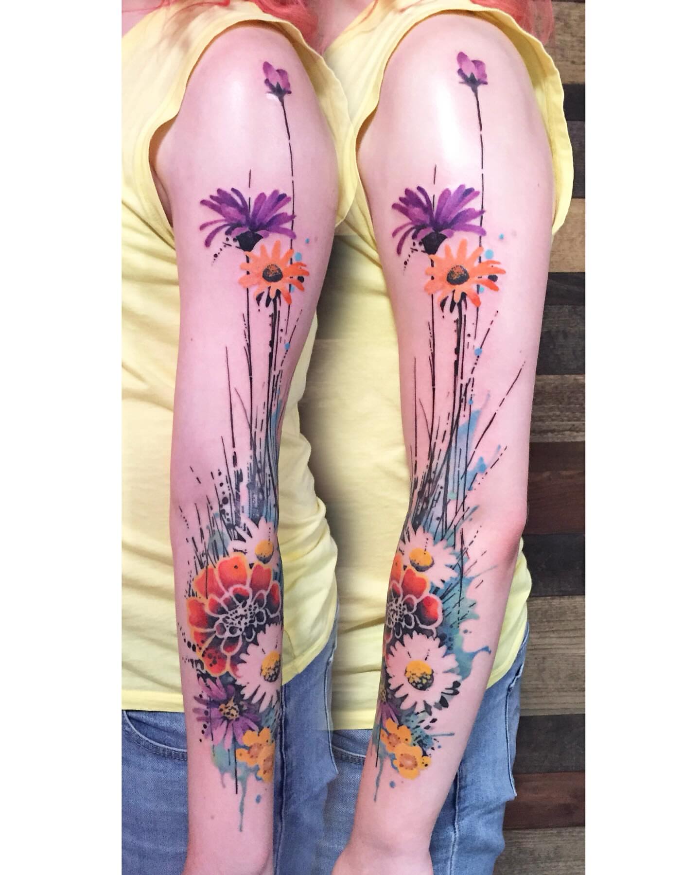 Watercolor flowers watercolor tattoo on the leg by Gene Coffey, New York, New York