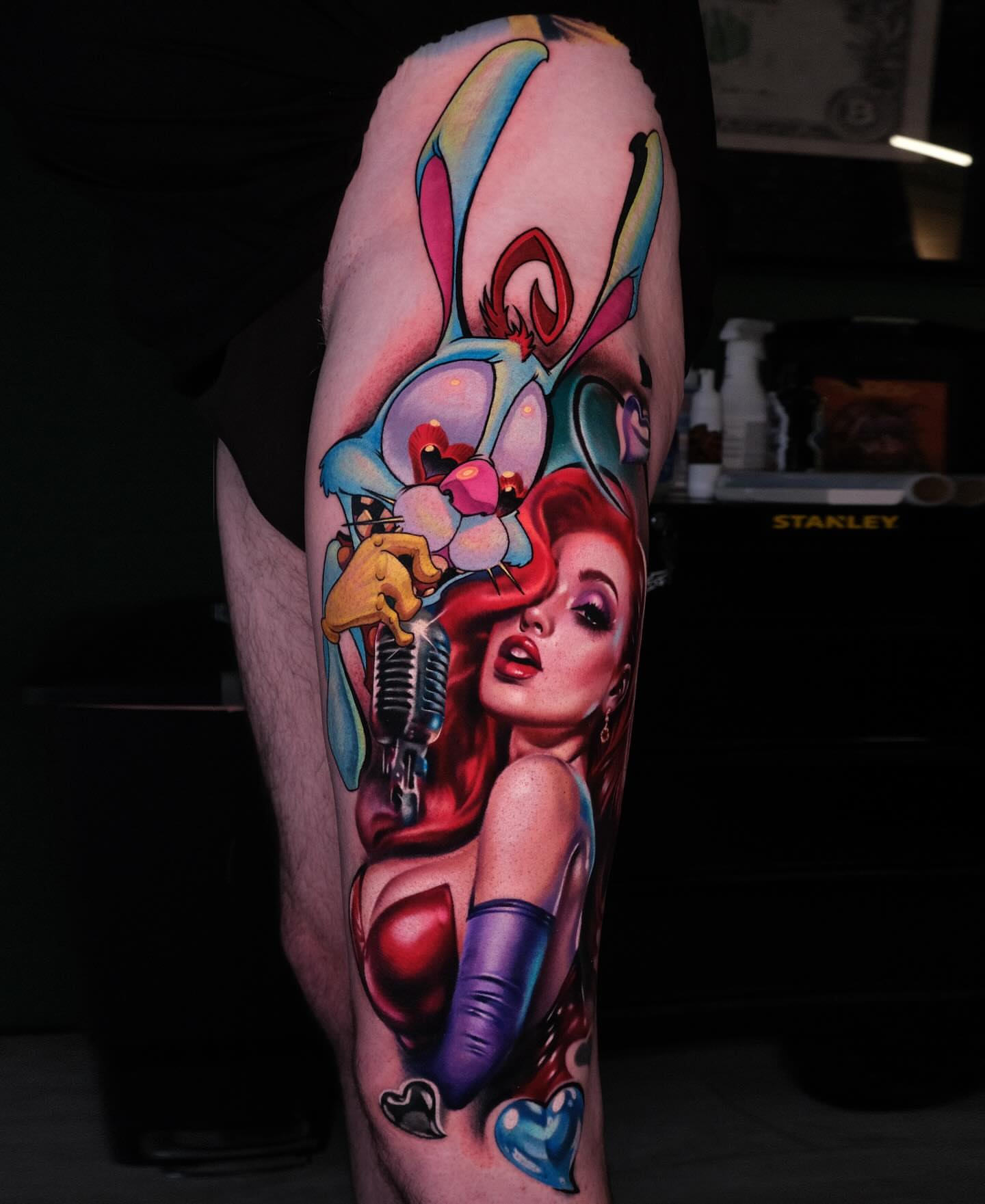 Anime-style character with rabbit anime tattoo on the forearm by Jesse Smith