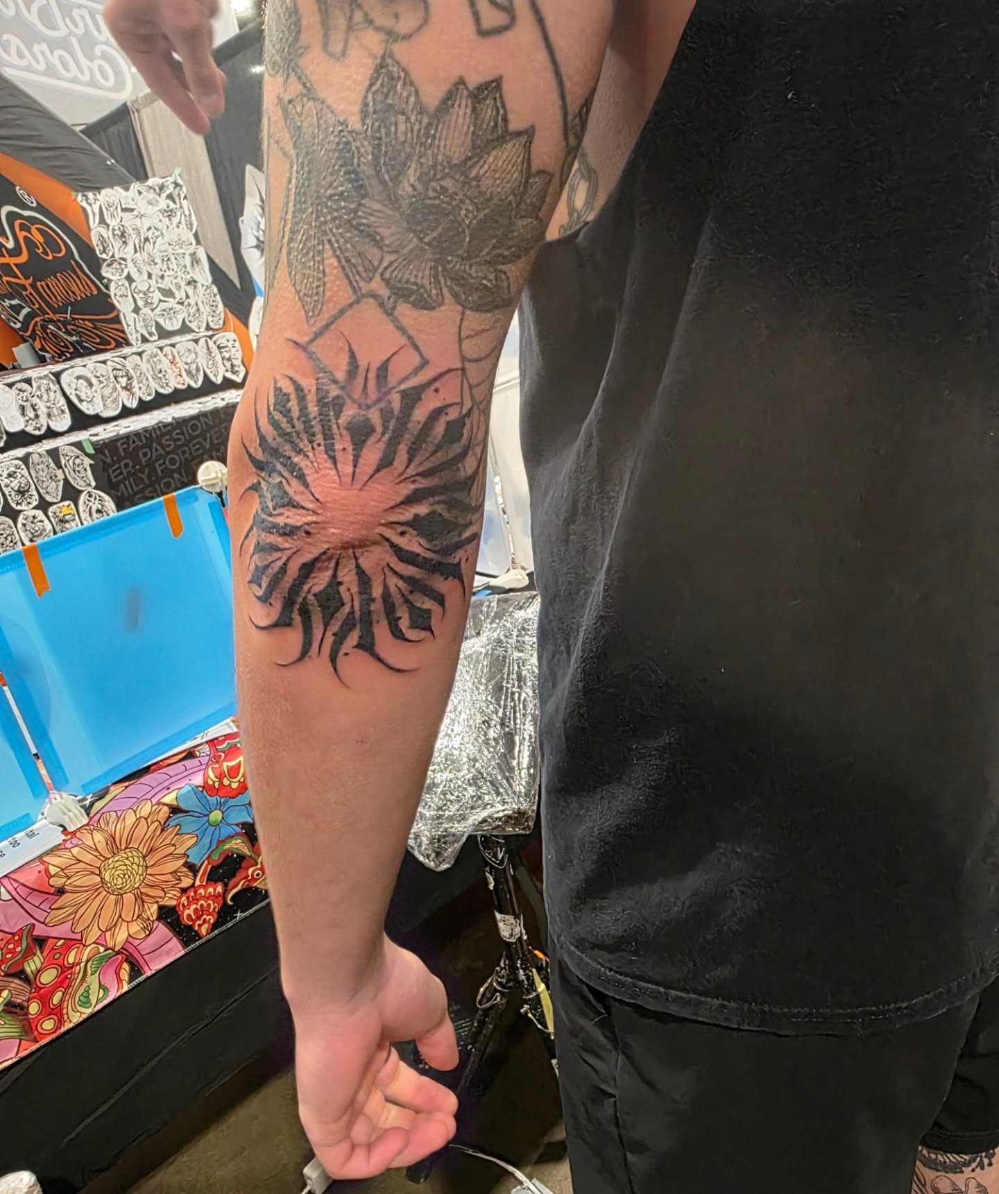 Sunburst black and grey tattoo on the forearm by Claudia Isabel Roman, El Paso, Texas
