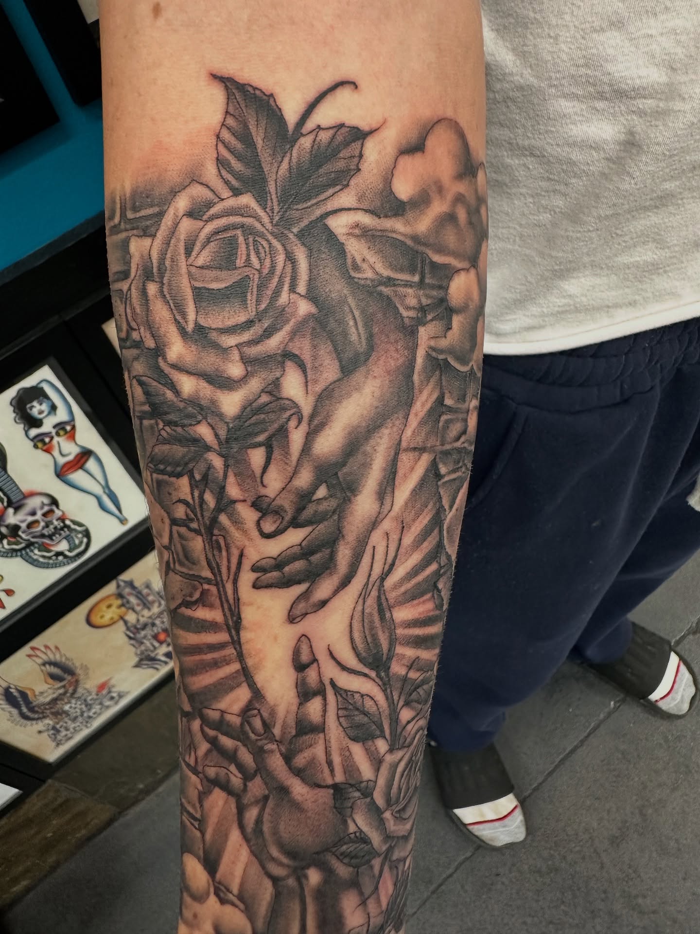Rose and skeleton realism tattoo on the forearm by Stevie O'Dell
