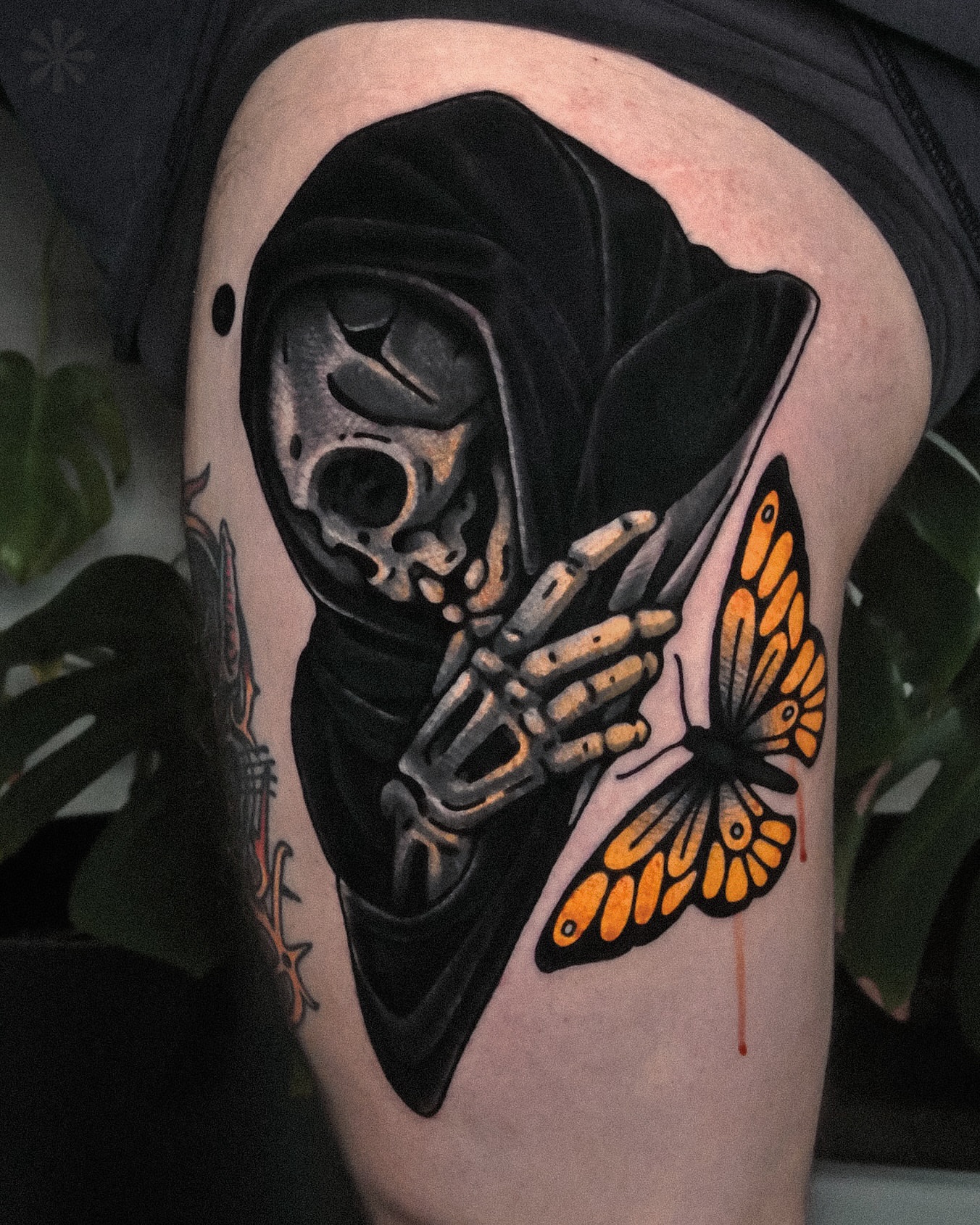 Grim reaper with butterfly dark realism tattoo on the thigh by Last Year Of Disaster