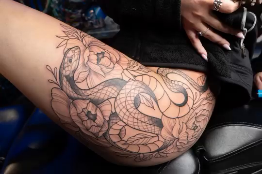 Serpent and floral lace ornamental tattoo by Abel Ponce