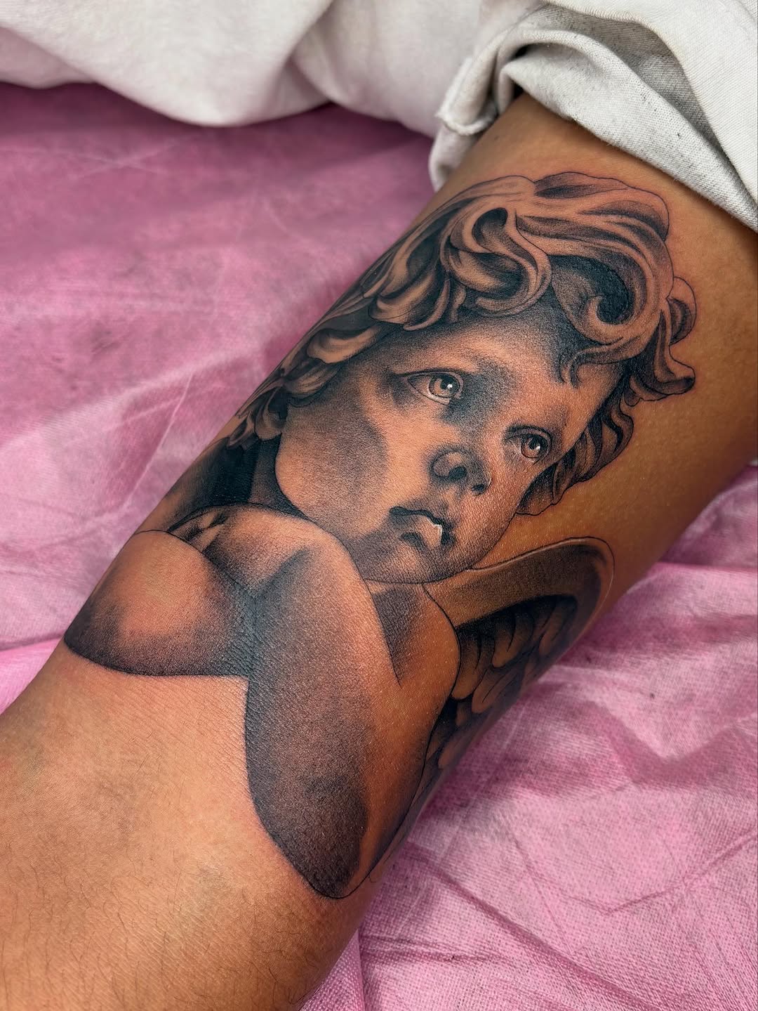 Cherub angel realism tattoo on the forearm by Savana ☆