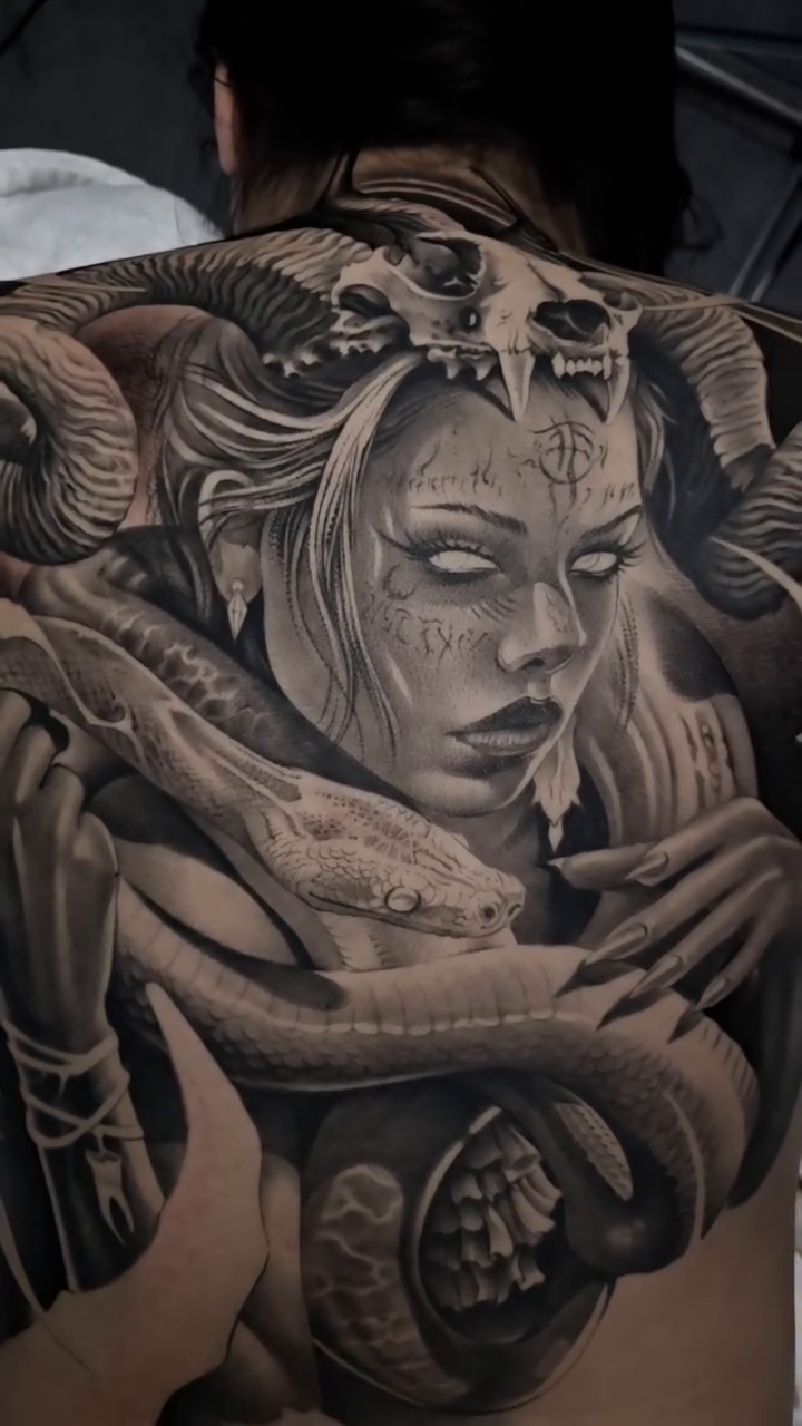 Tattoo by @gagecheesmantattoos — dark_realism, black_and_grey