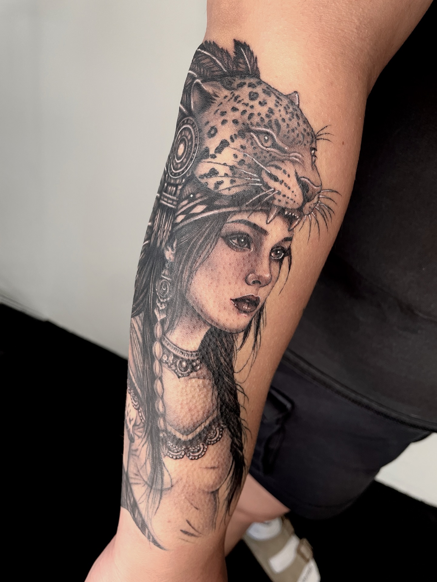 Woman with leopard realism tattoo on the forearm by LA tattoo