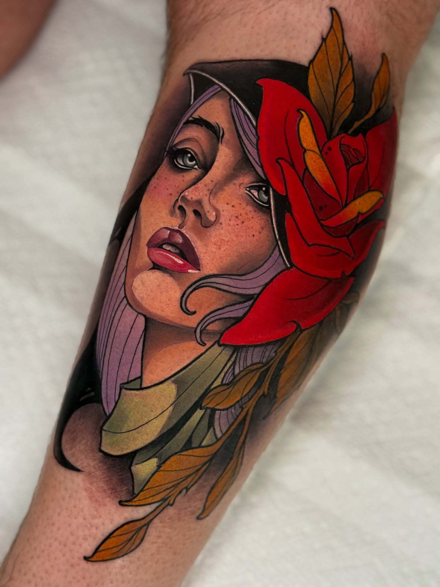 Woman with rose realism tattoo on the forearm by Neotrav Tattoos