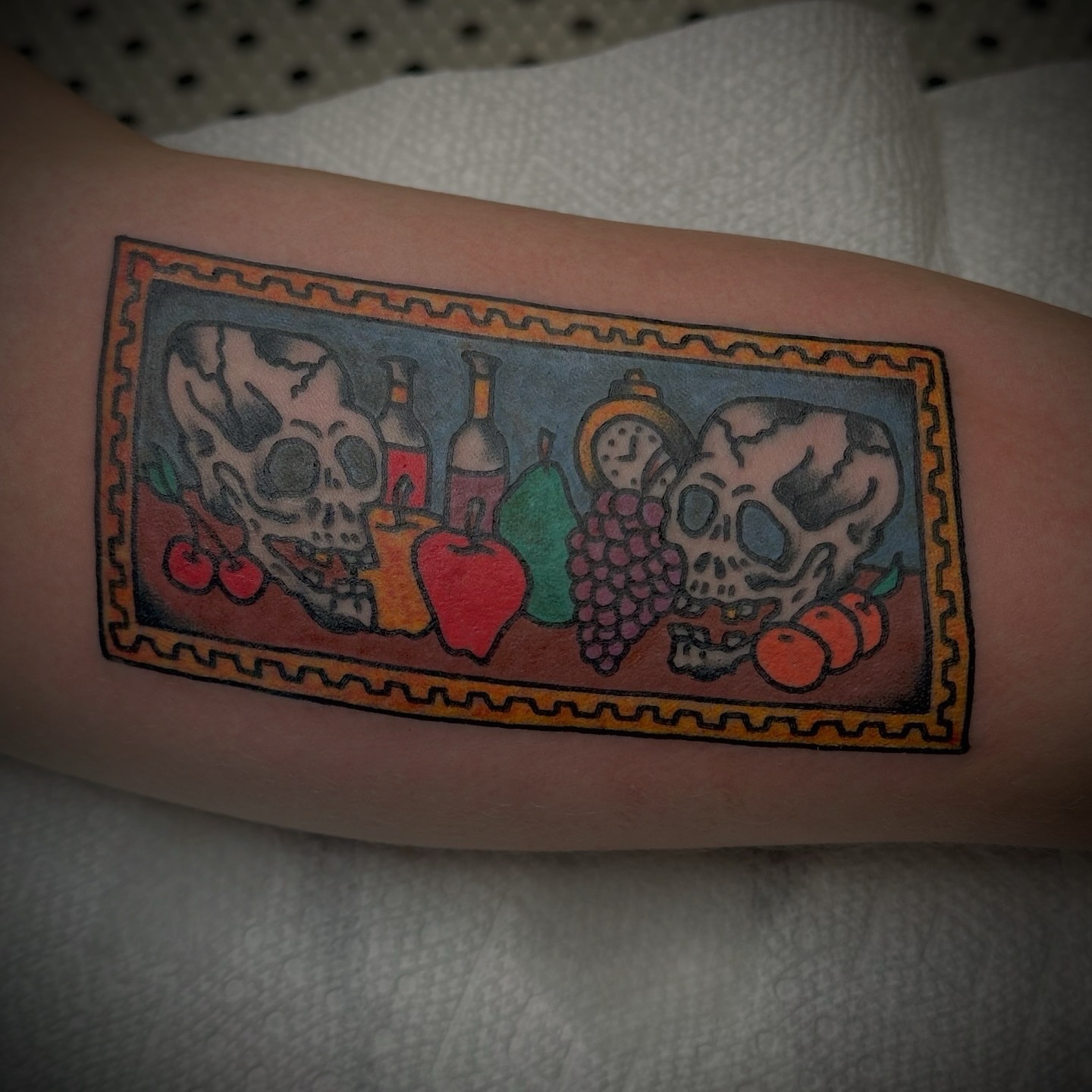 Skulls and fruit American traditional tattoo on the forearm by Kyle O’Hara ॐ, Nashville, Tennessee