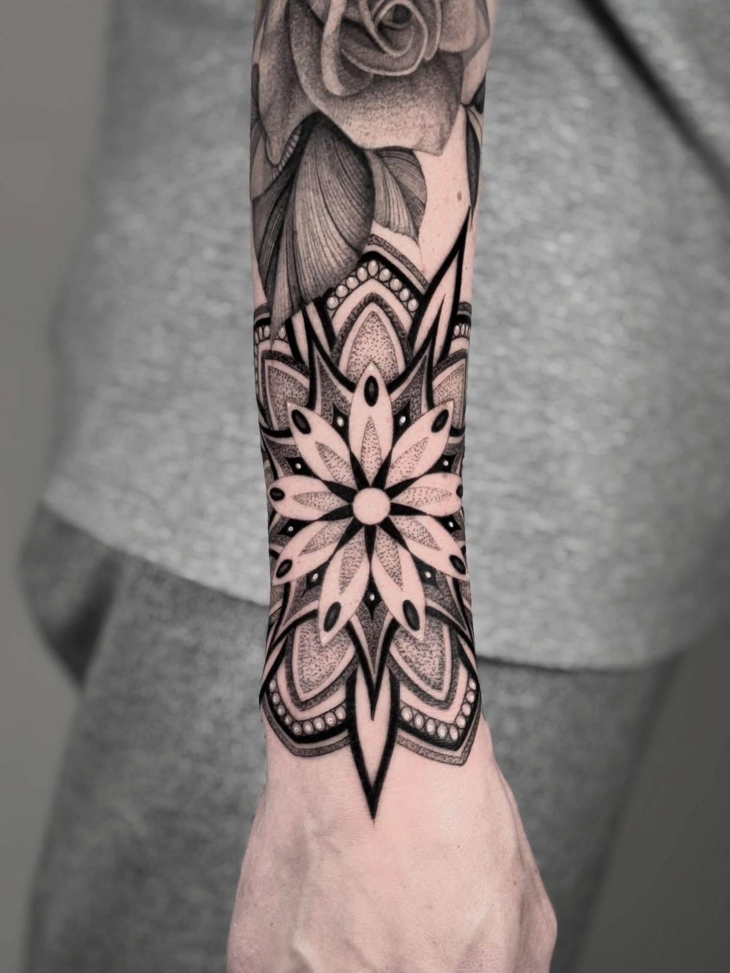 Mandala geometric tattoo on the forearm by Brittney Naami, San Francisco, California