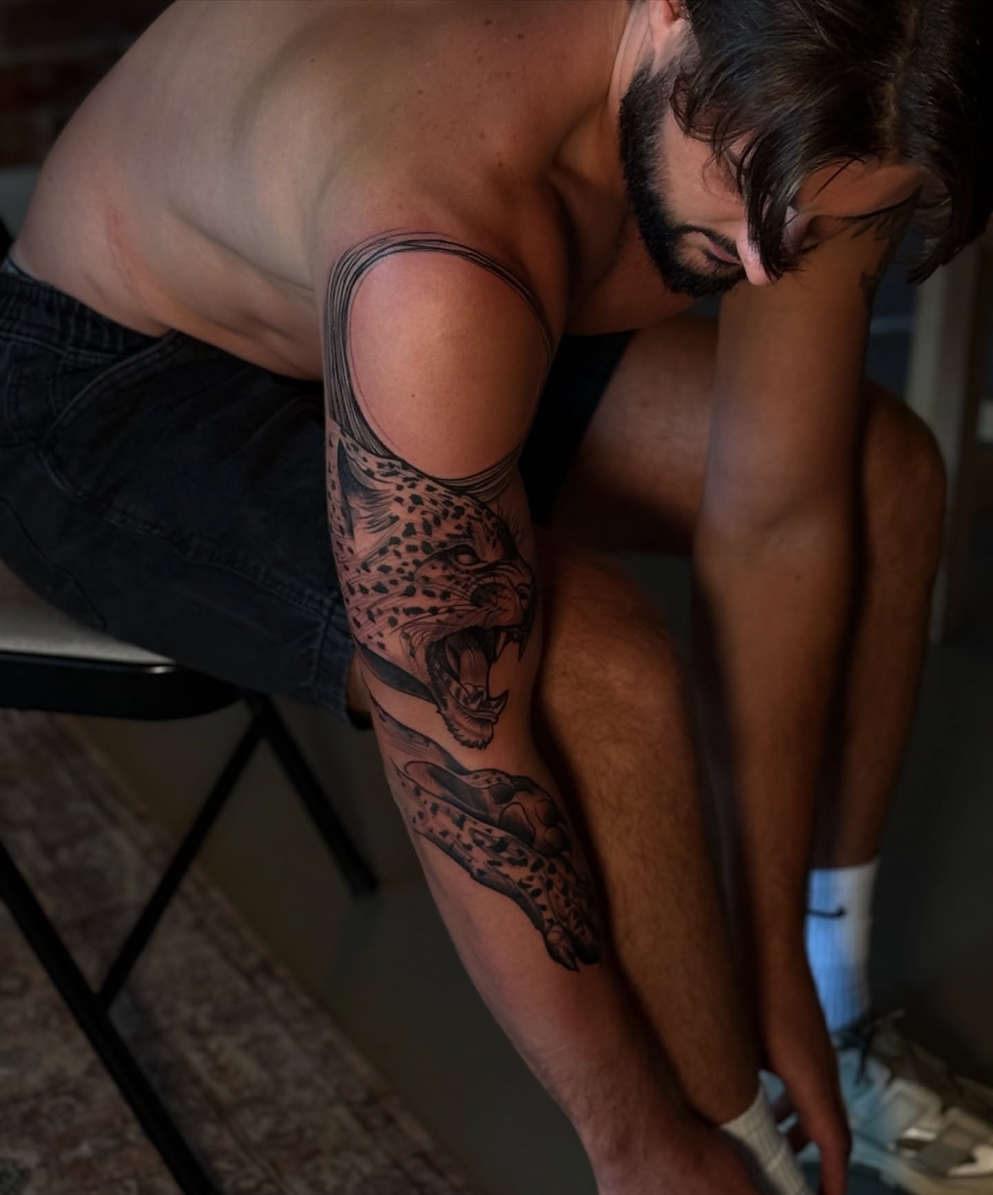 Leopard realism tattoo on the forearm by Iryna Polyakhova