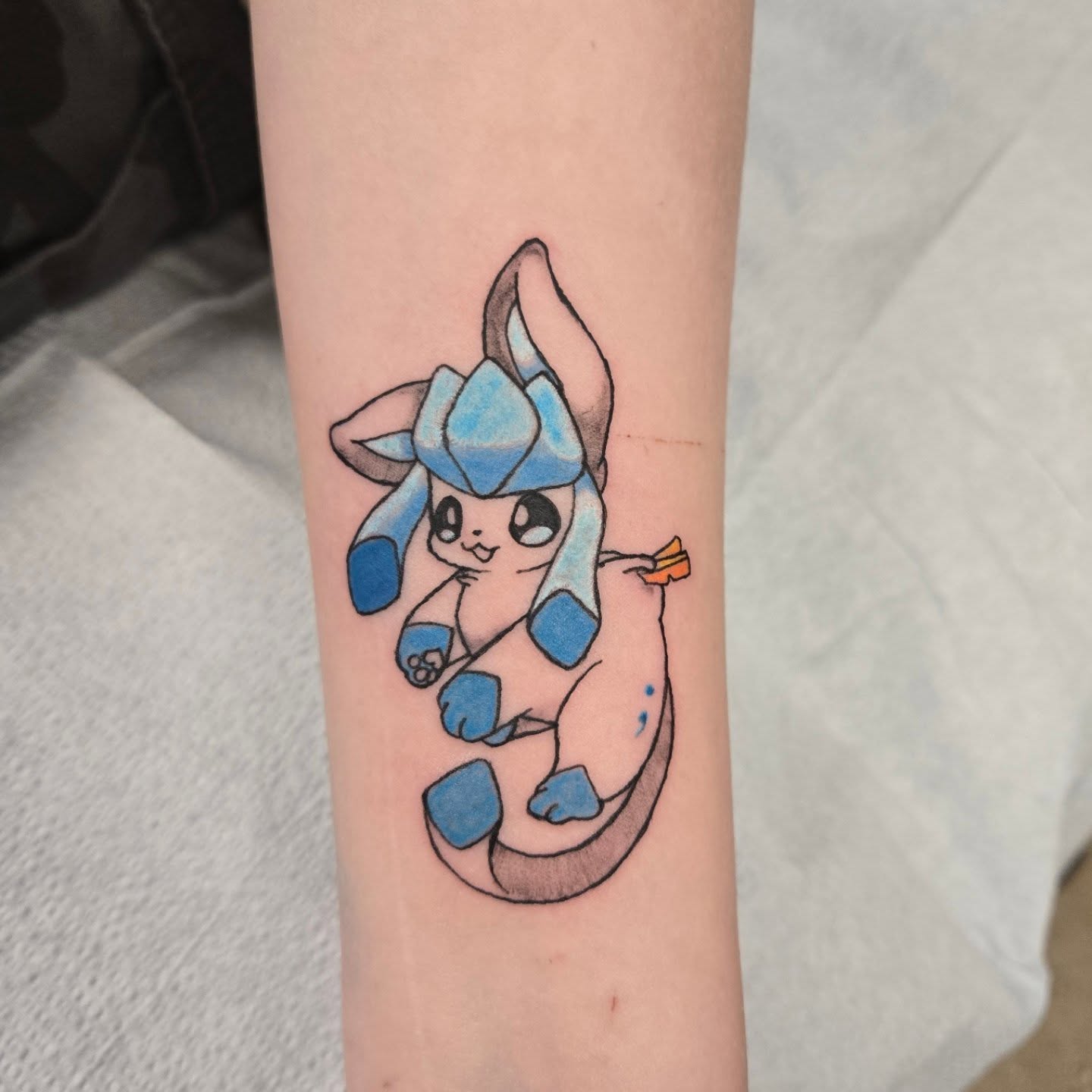 Slurpie anime tattoo on the forearm by Jose G. Rubio Tattoo Artist πΊπ²ππ¨π¦