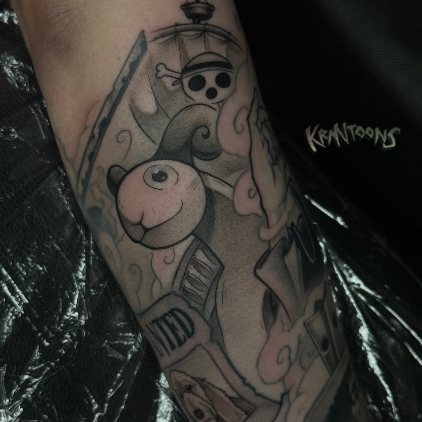Pirate ship and monkey black and grey tattoo on the forearm by Jason