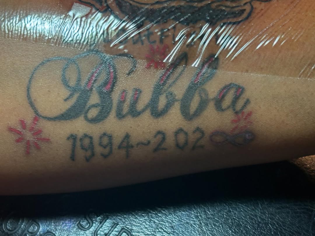 Name and dates tattoo on the forearm by Family and Loyalty